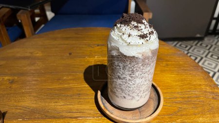 Photo for Iced frappe chocolate drink with whipped cream on top and grated chocolate crunch very delicious dessert - Royalty Free Image
