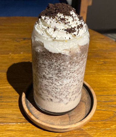 Photo for Iced frappe chocolate drink with whipped cream on top and grated chocolate crunch very delicious dessert - Royalty Free Image