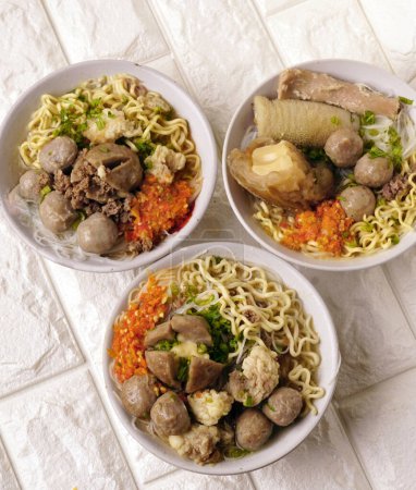 Delicious beef meatball soup tasty and healthy soup cooking also known as Bakso in Indonesia with fresh chili paste