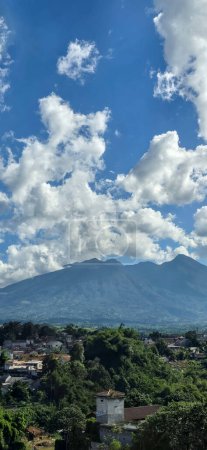 Beautiful landscape morning view of Mount Salak or Gunung Salak taken from batu tulis area in central Bogor city Indonesia west java
