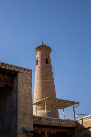 hotel tower nearby Ichan qala, historical and architectural monuments in Khiva, Uzbekistan