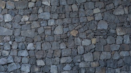 Robuste graue Steine, zeitloses Mauerwerk