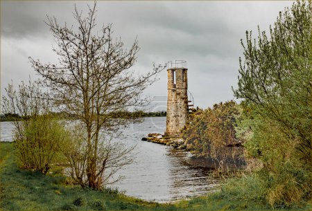 An ancient stone built lighthouse on Lough Corrib, County Galway 