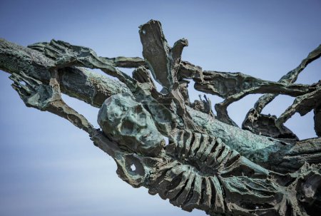 Photo for Murrisk, Demesne, Murrisk, County Mayo, Ireland - April 20th 2024 - Irish monument to the famine with a close up  of skeleton on a sailing ship - Royalty Free Image