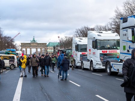 Photo for Berlin, Germany January 15, 2024. Trucks and tractors in the center of the capital. Farmers' demonstration. Berlin, Germany January 15, 2024 - Royalty Free Image