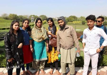 Photo for DELHI INDIA - 02 12 2023: Family portrait of Indian people posing in a park - Royalty Free Image