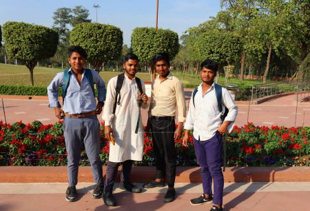 Photo for DELHI INDIA - 02 12 2023: Portrait of Indian young men posing in a park of New Delhi - Royalty Free Image