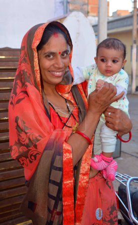 Photo for JODHPUR RAJASTHAN INDIA - 02 13 2023: Portrait of indian mother and her child - Royalty Free Image