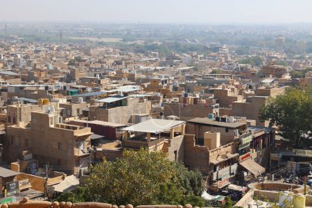 Photo for JAISALMER RAJASTHAN INDIA - 02 13 2023: View of Jaisalmer city from inside of Jaislamer Fort or Sonar Quila or Golden Fort. UNESCO world heritage site at Thar desert along old silk trade route. - Royalty Free Image