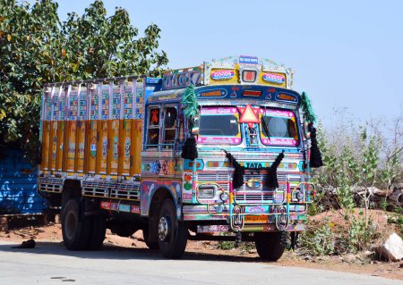 Photo for RAJASTHAN INDIA - 02 16 2023: Bright agricultural truck Tata at an intrurban road. - Royalty Free Image