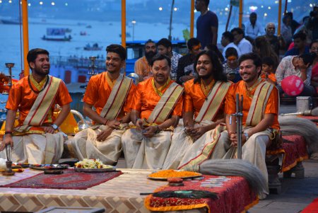 Photo for VARANASI BHOJPUR PURVANCHAL INDIA - 03 05 23: Hindu priests performs the Ganga Aarti ritual in Varanasi. Hindu ritual that takes place at Dashashwamedh Ghat on the banks of the river Ganges - Royalty Free Image