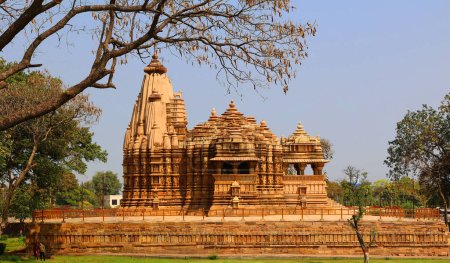 Photo for KHAJURAHO INDIA MADYHA PRADESH - 03 03 2023: Khajuraho Group of Monuments are a group of Hindu and Jain temples famous for their nagara-style architectural symbolism and a few erotic sculptures - Royalty Free Image