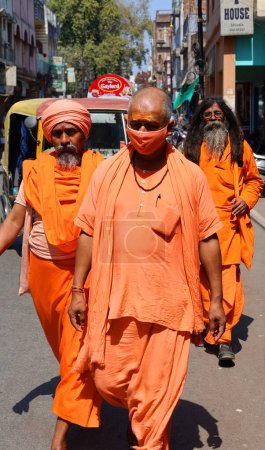 Photo for VARANASI BHOJPUR PURVANCHAL INDIA - 03 05 2023: Sadhu or Baba (holy man) on the street. Normally a sadhu is a monk, renounced, renounced material enjoyment. In India from 4 to 5 million in India - Royalty Free Image