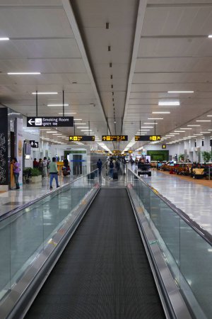 Photo for DELHI INDIA - 03 10 2023: Flat escalator at the international airport in Delhi airport - Royalty Free Image