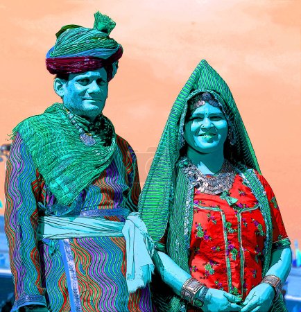 Foto de UDAIPUR RAJASTHAN INDIA - 02 20 2023: Ilustración de una pareja india en traje nacional de sari rajasthan - Imagen libre de derechos