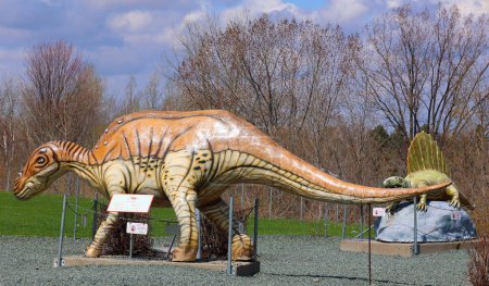 Photo for SAINT-LEONARD-D'ASTON QUEBEC CANADA - 04 15 2023: Maiasaura, meaning the feminine form of saurus, meaning "reptile is a large herbivorous saurolophine hadrosaurid ("duck-billed") dinosaur - Royalty Free Image