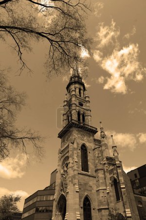 Photo for MONTREAL QUEBEC CANADA - 05 09 23: Bell tower Saint-Jacques Cathedral was the Roman Catholic cathedral in Montreal from 1825 to 1852 named for St. James the Greater now Universite du Quebec a Montreal - Royalty Free Image