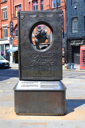 Photo for LONDON UNITED KINGDOM - 06 19 2023: Agatha Christie Memorial is a memorial to author and playwright Agatha Christie, located at the intersection of Cranbourn Street and Great Newport Street by St Martin - Royalty Free Image
