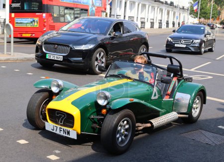 Photo for LONDON UNITED KINGDOM - 06 17 2023: Caterham 7 (or Caterham Seven) is a super-lightweight sports car produced by Caterham Cars in the United Kingdom. It is based on the Lotus Seven, a lightweight sport - Royalty Free Image