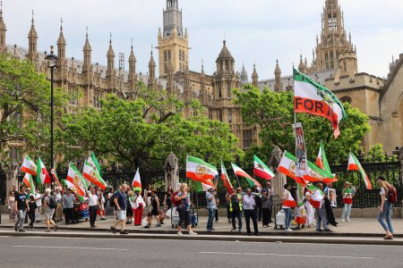 Photo for LONDON UNITED KINGDOM - 06 19 2023: People protesting in front the Westminster parliament for free Iran. - Royalty Free Image