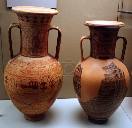 Photo for LONDON UNITED KINGDOM 06 17 2023: Pottery neck-handled amphoras with a detachable bronze lid, probably used as a grave-marker. - Royalty Free Image