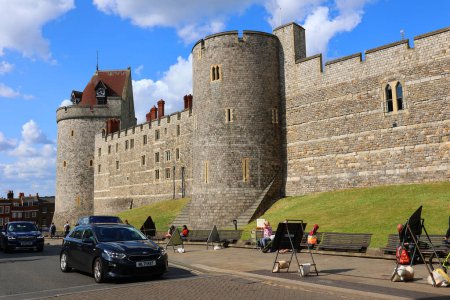 Photo for WINDSOR, UNITED KINGDOM 06 19 2023: Windsor Castle is a royal residence at Windsor in the English county of Berkshire. It is strongly associated with the English and succeeding British royal family - Royalty Free Image