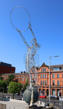 Photo for BELFAST NORTHERN IRELAND UNITED KINGDOM 06 03 2023: Beacon of Hope or Thanksgiving Square Beacon public art metal sculpture by Andy Scott 19.5 metres high constructed in 2007 - Royalty Free Image