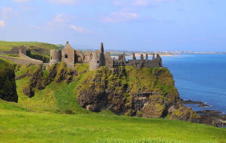 Photo for Dunluce is one of the most picturesque and romantic of Irish Castles. - Royalty Free Image