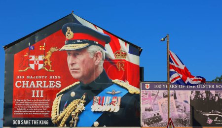 Photo for BELFAST NORTHERN IRELAND UNITED KINGDOM 06 03 2023: Unveiled giant sign on the Shankill Road, Belfast, to mark the coronation of King Charles III and Queen Camilla - Royalty Free Image
