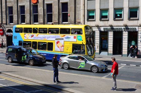 Photo for DUBLIN REPUBLIC OF IRELAND 05 28 2023: Dublin Bus is a State-owned bus operator providing services in Dublin. By far the largest bus operator in the city, it carried 138 million passengers in 2019 - Royalty Free Image