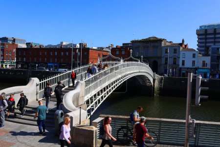 Photo for DUBLIN REPUBLIC OF IRLAND 05 28 2023: Ha'penny Bridge known later for a time as the Penny Ha'penny Bridge, and officially the Liffey Bridge, is a pedestrian bridge built in 1816 over the River Liffey - Royalty Free Image