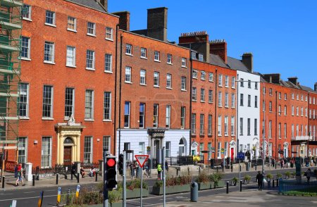 Photo for DUBLIN REPUBLIC OF IRELAND 05 28 2023: A terrace or terraced house (UK) or townhouse is an architectural term for a form of medium-density housing that originated in Europe in the 16th century - Royalty Free Image