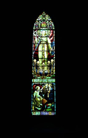 Photo for DUBLIN REPUBLIC OF IRELAND 05 28 2023: West End of the Cathedral is the window known as the Saint Patricks Window. This tells the story of the life of Saint Patrick in 39 different episodes - Royalty Free Image