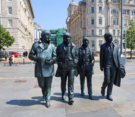 Photo for LIVERPOOL UNITED KINGDOM 06 07 20 Beatles Statue arrived on Liverpool's Waterfront in 2015. Donated by the famous Cavern Club, the placement of the statue coincides with the 50 year anniversary - Royalty Free Image