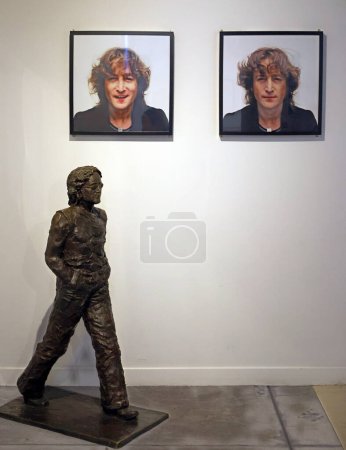 Photo for LIVERPOOL UNITED KINGDOM 06 07 2023: Statue of John Lennon at The Beatles Story is a museum in Liverpool about the Beatles and their history. It is located on the historical Royal Albert Dock - Royalty Free Image