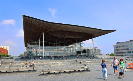 Photo for CARDIFF WALES UNITED KINGDOM 06 17 23: Senedd, also known as the National Assembly building was opened by Queen Elizabeth II in 2006 in Cardiff, South Wales and is the location of the Welsh Parliament - Royalty Free Image