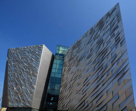 Photo for BELFAST NORTHERN IRELAND UNITED KINGDOM 06 03 2023: Titanic Belfast museum a monument to Belfast's maritime heritage on the site of the former Harland and Wolff shipyard in the Titanic Quarter - Royalty Free Image