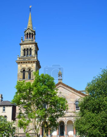Photo for BELFAST NORTHERN IRELAND UNITED KINGDOM 06 03 2023: Elmwood Hall Tower in Belfast, with its three layers of Corinthian columns supporting arches with dentil accents resembles an Italian campanile - Royalty Free Image