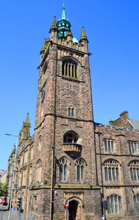 Photo for BELFAST NORTHERN IRELAND UNITED KINGDOM 06 03 2023: The clock tower of the Presbyterian Church House caught my attention. I zoomed in to admire the crown-shaped, copper dome with delicate pinnacles. - Royalty Free Image