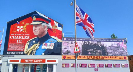 Photo for BELFAST NORTHERN IRELAND UNITED KINGDOM 06 03 2023: Unveiled giant sign on the Shankill Road, Belfast, to mark the coronation of King Charles III and Queen Camilla - Royalty Free Image