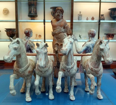 Photo for LONDON UNITED KINGDOM 06 20 2023: Terracotta group of Zeus driving a four-horse chariot made in Apulia at the British Museum - Royalty Free Image