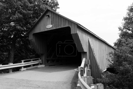 Photo for COWANSVILLE QUEBEC CANADA 08 21 2023: Freeport Covered Bridge built in the 1870s in the Eastern Townships one hour south of Montreal - Royalty Free Image