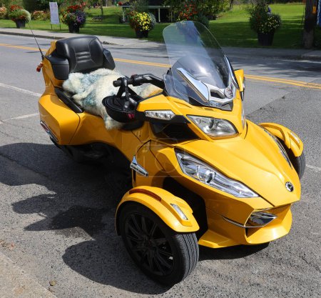 Photo for KNOWLTON QUEBEC CANADA 09 17 2023: The Can-Am Spyder ("Spyder") is a three-wheeled motorcycle manufactured by Can-Am Motorcycles, a division of Bombardier Recreational Products. - Royalty Free Image