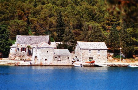 Photo for BRAC ISLAND CROATIA 06 12 2000: Environmentally friendly abilities, stone homes also deserve a round of applause for their natural beauty that does not demand any painting or siding. - Royalty Free Image