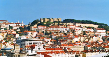 Photo for LISBON PORTUGAL 10 02 2002: The Castelo de Sao Jorge (St. George Castle) is one of Lisbon's most distinctive monuments, being situated on the city's highest hill. - Royalty Free Image
