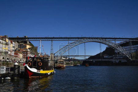 Photo for View of O Porto in Cais da Ribeira with the Luis I bridge in the background - Royalty Free Image