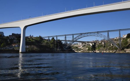 View from the Douro River of the Sao Joao Bridge, the Dona Maria Pita Bridge and the Infante Dom Henrique Bridge in O Porto