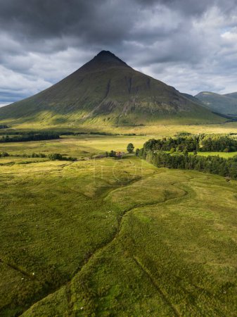Aerial view of mountains with green grass and forest at Auch, Bridge of Orchy, Scottish Highlands