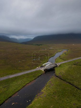 Aerial view of the A82 road and the River Etive and River Etive Bridge at Glencoe, Ballachullish, Scottish Highlands