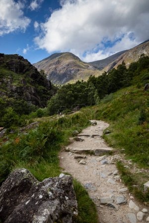 Photo for Mountain path on Ben Nevis leading to Steall waterfall. Scottish highlands on a summer's day - Royalty Free Image